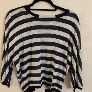 Women’s navy and white striped shirt.